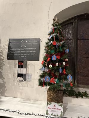 Ysgol Rhiwabon tree alongside the Old Boys Association memorial.