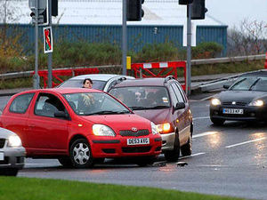 Supporting image for story: Car crash chaos at busy roundabout