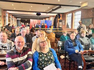 Teams being filmed during the auction