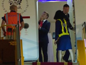 Supporting image for story: Macron cites horseplay as wife appears to push the French leader