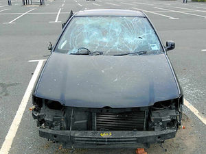 Supporting image for story: Abandoned car a "mangled wreck" after vandals attack at Shrewsbury retail park