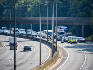 Supporting image for story: M5 shut as man trespasses on railway line over motorway