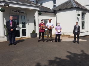 Supporting image for story: Kindles presented to Telford care homes as £10,000 raised by community