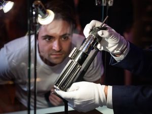 Supporting image for story: Darth Vader lightsaber expected to sell for millions goes on display in London