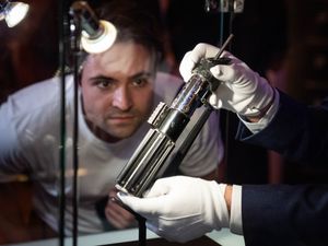 Supporting image for story: Darth Vader lightsaber expected to sell for millions goes on display in London