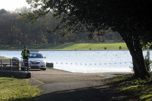 Police cordon of a lake after the body was found in Dartmouth Park, West Bromwich.