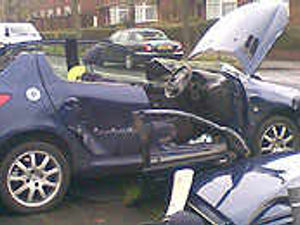Supporting image for story: Mother trapped as car overturns