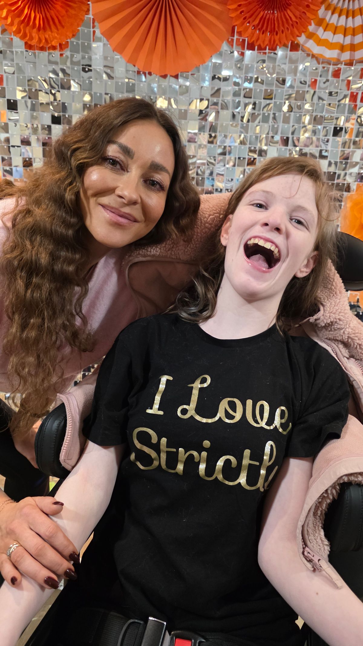 Star from Strictly dances with children at Acorns