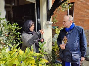 Lib Dem leader Ed Davey chatting with a resident during a visit to the West Midlands 