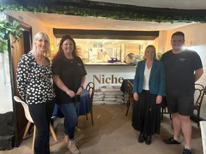 Helen Morgan (pictured green jacket) at Niche Patisserie in Oswestry.