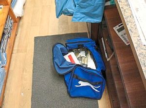 A holdall containing packets of cigarettes