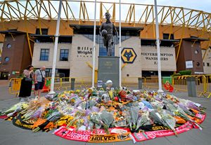 Tributes to former Wolves player Diogo Jota outside Molineux. Photo: Tim Thursfield