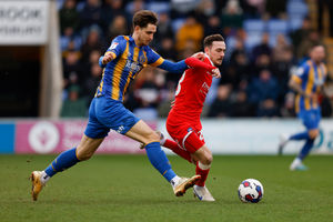 Tom Bayliss of Shrewsbury Town and Josh Scowen of Wycombe Wanderers (AMA)