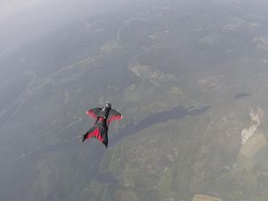 Supporting image for story: Wingsuit flying is even more impressive when done in formation