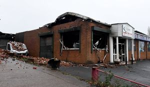 The burned out tackle shop in Hayes Lane, Lye which was on fire last night, with crews battling the blaze overnight,