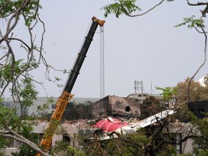 Supporting image for story: UK investigators arrive in India as tributes pour in for plane crash victims