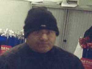 Supporting image for story: Image released to catch robber