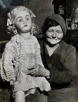 Photos show Doris Harrison with the doll she was gifted as a seven-year-old