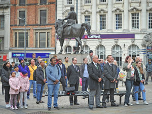 Supporting image for story: Crowds gather at big screens put up across region for Queen's funeral
