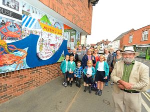 Supporting image for story: Eager volunteers unveil Ludlow Art Mural Project