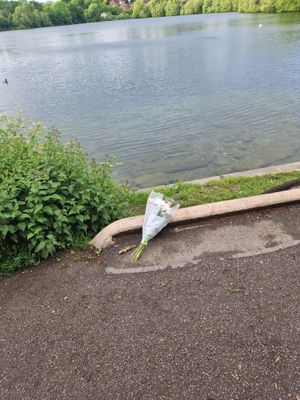 A bouquet of flowers left by the reservoir on Tuesday