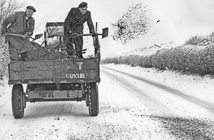 Montford Bridge, January 17, 1955: 'Despite hard work by road gangs, Shropshire roads were treacherous yesterday. The A5 on the Welsh side of Shrewsbury was particularly bad. These men were spreading grit at Montford Bridge, near Shrewsbury,' read the caption.