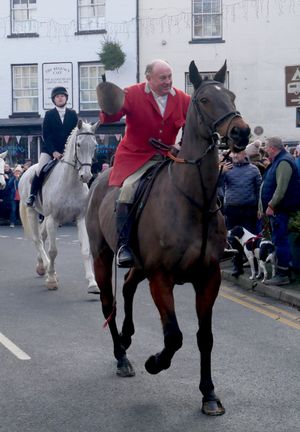 Robert Jones, senior joint master of the Radnor and West Herefordshire Hunt acknowledges the crowds as he rode off to follow the false trail.