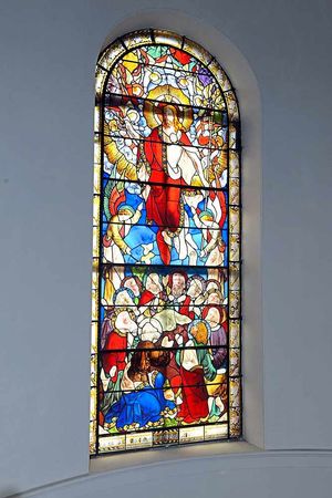 An elegant stained glass window in the entrance hall.