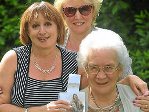 Supporting image for story: Note in book opens up new chapter for family