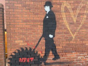 Supporting image for story: Banksy-style artwork appears at Compton Care superstore in Wolverhampton