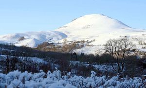 Snow on the hills around Church Stretton