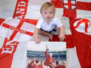 Supporting image for story: Shropshire's very own Bobby Moore - aged one - is flying the flag for England