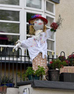 This scarecrow had a lovely face of makeup, and her eyelashes are elegant!