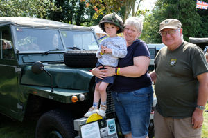 Mini military enthusiast Aidan Davies maybe just three but he is the youngest official member of the Wye Valley Military Vehicle Trust. Pictured here with his grandparents Shirley and Keith Hazlewood, Aidan is also the face of summer camp this year at Bovington Tank Museum. Aidan from Llandrindod Wells has been attending Kington Vintage Show since he was nine months old. Image by Andy Compton