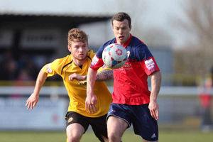 Shaun Whalley of AFC Telford United and Ryan Higgins of Leamington