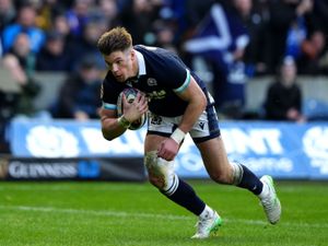 Huw Jones scores against Italy