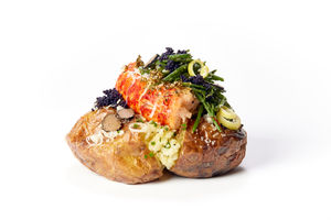 The potato features a lobster tail, caviar and truffles