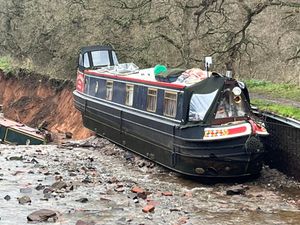 The narrowboat Pacemaker was left hanging precariously over the precipice of a 50-metre-long hole following a disaster along the Llangollen Canal on Monday, December 22