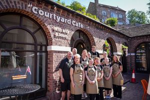 Staff outside the newly renovated cafe (Courtyard Cafe/Facebook)