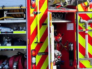 Supporting image for story: Three people rescued from car in water