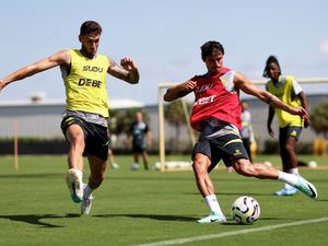 Supporting image for story: "I'm over the moon for Santi" - Wolves defender praised for professional outlook