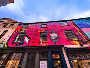 Mural inspired by fashion designer Paul Smith in Bridlesmith Gate in Nottingham