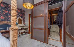 The house comes equipped with a 'hidden' room that features as a walk-in wardrobe. Credit Zoopla