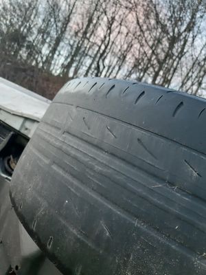 The car's tyres were badly worn