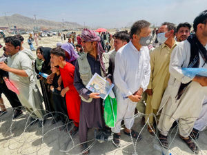 Supporting image for story: Afghan refugee donation point runs out of space as contributions pour in