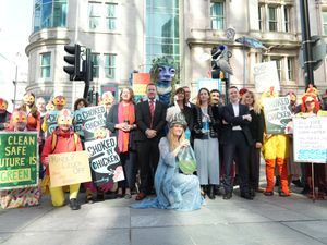 Activists gathered outside the High Court in Cardiff to protest about a chicken farm in Shropshire. Picture: River Action/A Heggerty