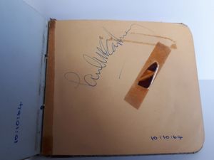 Paul McCartney's autograph and plectrum 