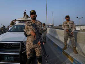 A paramilitary soldier on a road near Karachi port as military tension between Pakistan and India rises