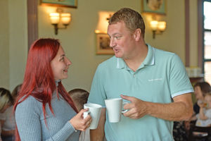 Oksana Kiptiak chats with Paul Sparkes, one of the first people to welcome a Ukrainian family to Rugeley