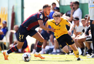 Joe Hodge takes on a Levante player in Wolves' pre-season clash (Getty)